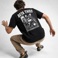 Beta Thief raccoon climbing graphic tee, black, back print on men model